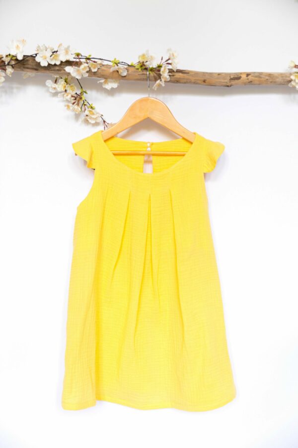 Zoé, la robe à plis et volants